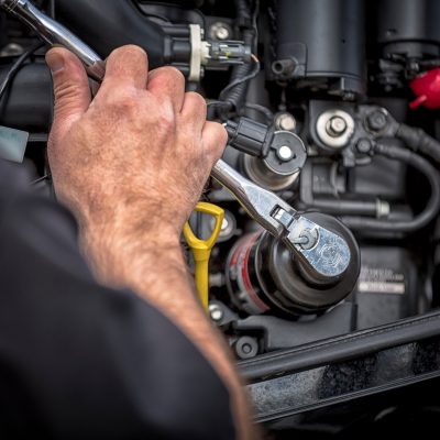 engine-maintenance-turning-wrench